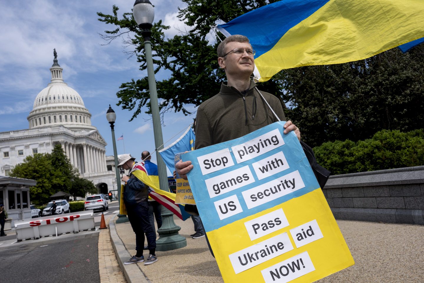 Activists supporting Ukraine, demonstrate outside the Capitol in Washington, on April 20, 2024.