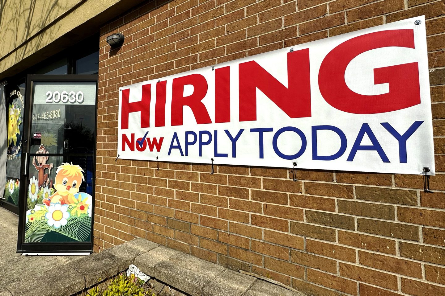 A hiring sign is displayed in Riverwoods, Ill., on April 16, 2024.