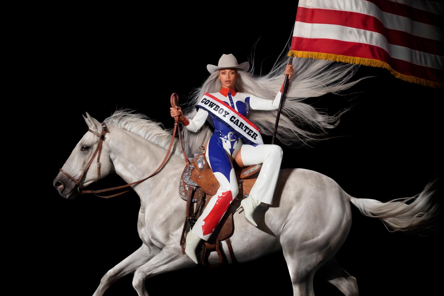Beyoncé posing on horseback for an album cover