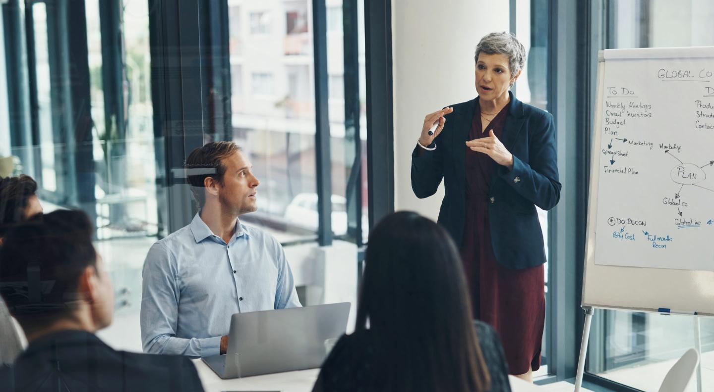 Woman teaches workers new skills