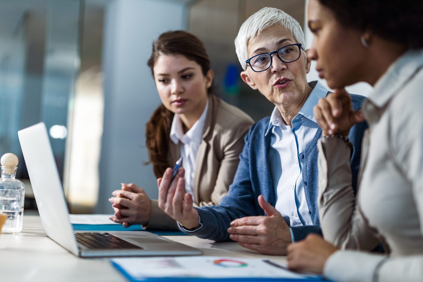 Workers discuss a difficult situation.