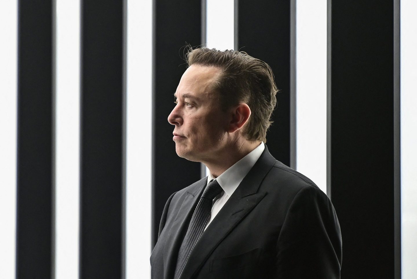 Tesla CEO Elon Musk is pictured as he attends the start of the production at Tesla's "Gigafactory" on March 22, 2022 in Gruenheide, southeast of Berlin.