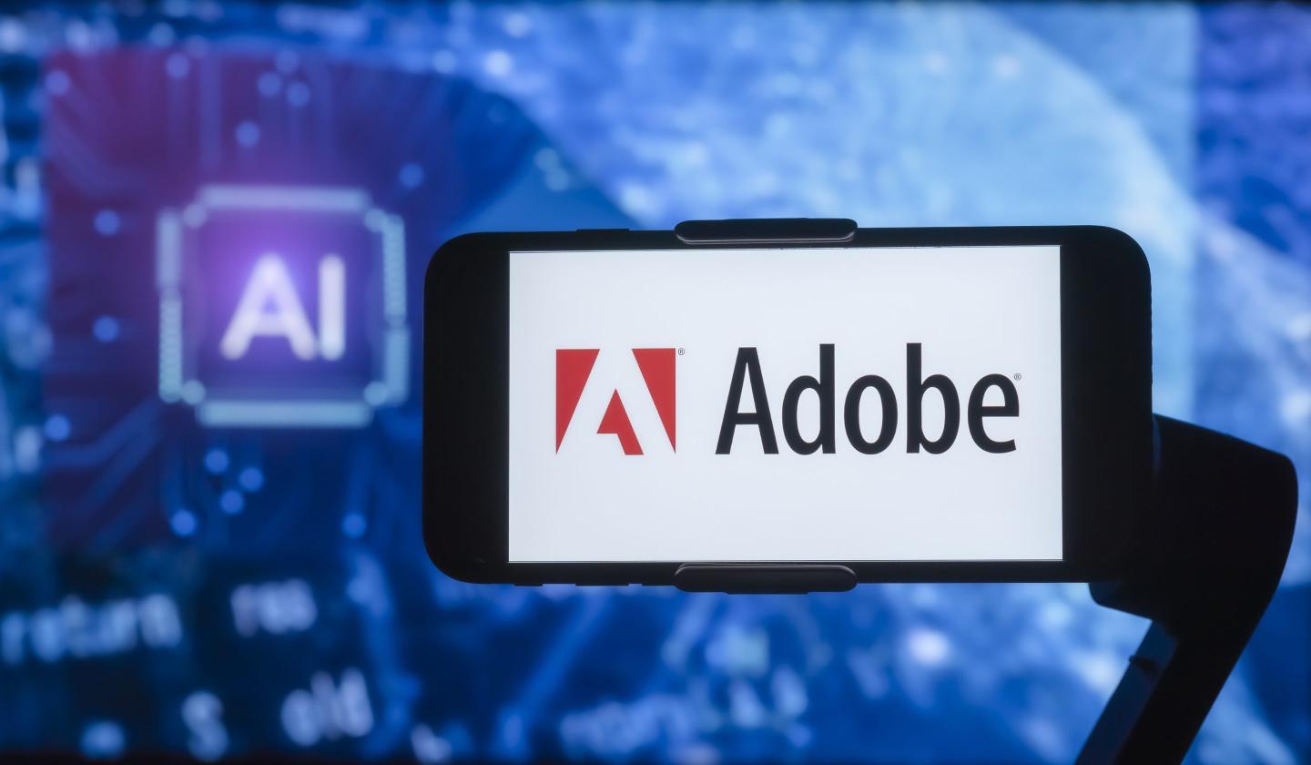 Adobe’s CFO on using AI to hit a $21.5 billion revenue target and stand out among peers including Canva
