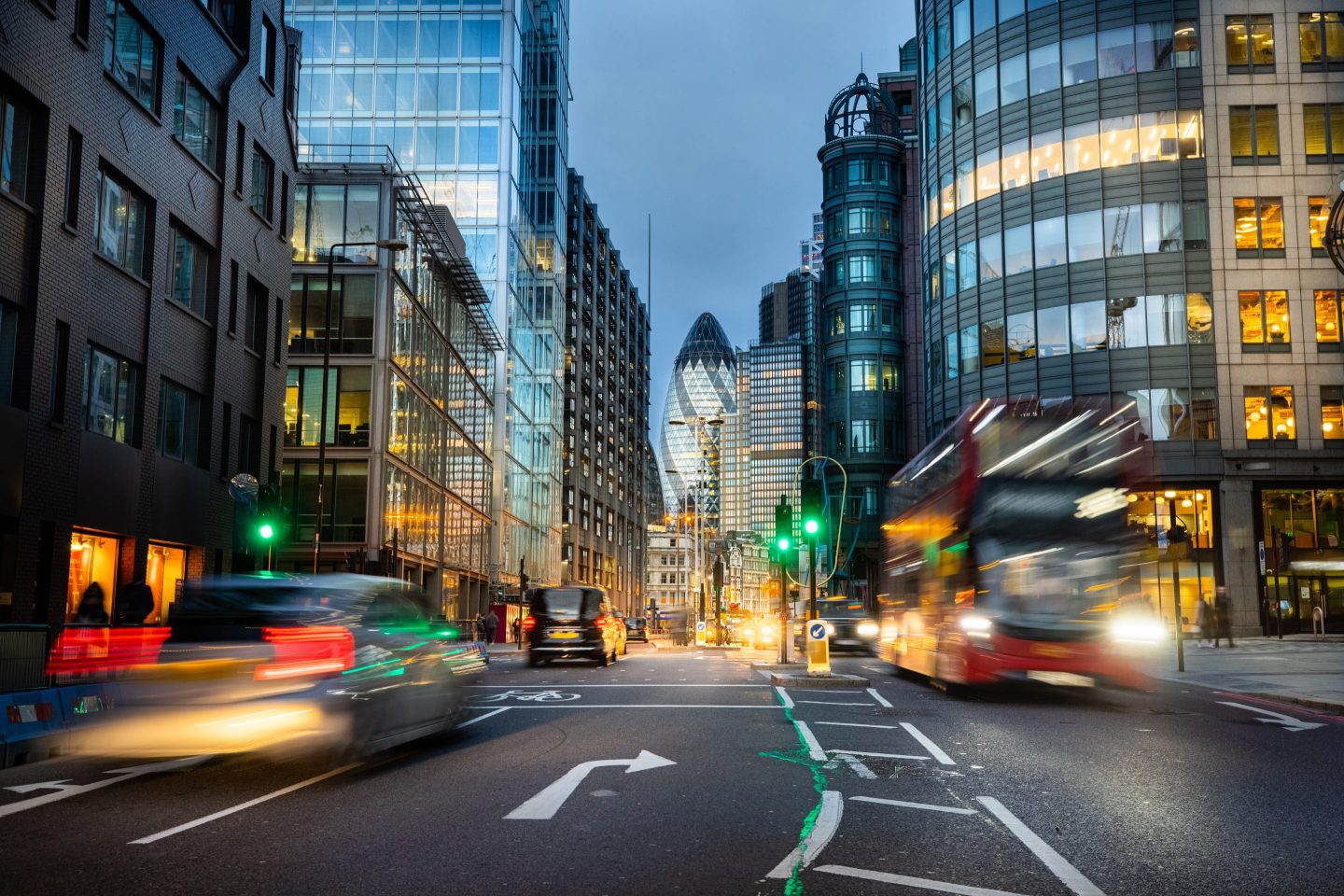 Buses traffic on the street at the financial district of London.