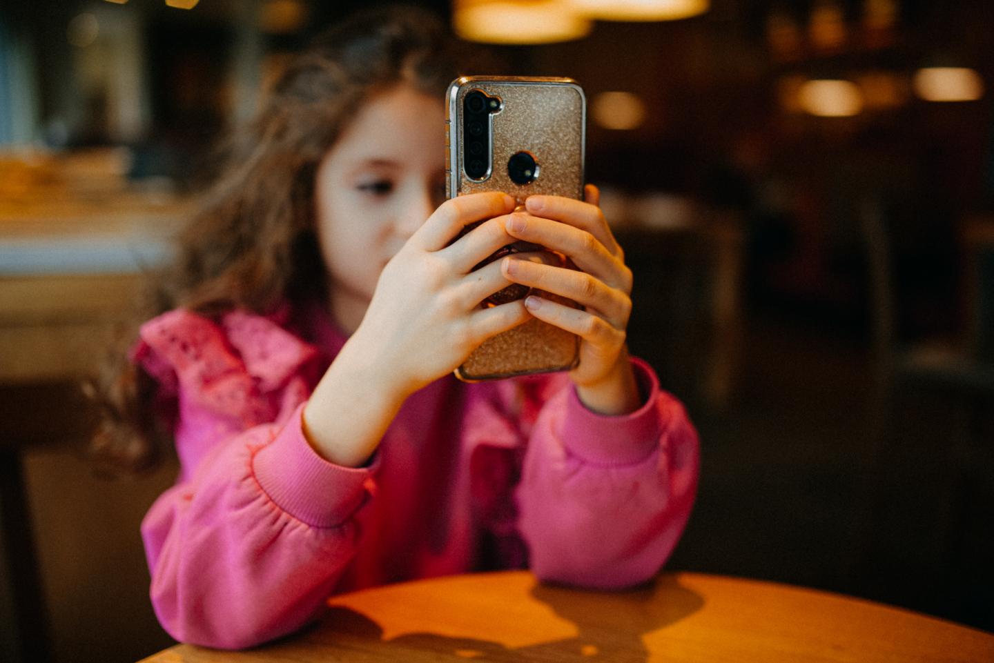 Kid on phone