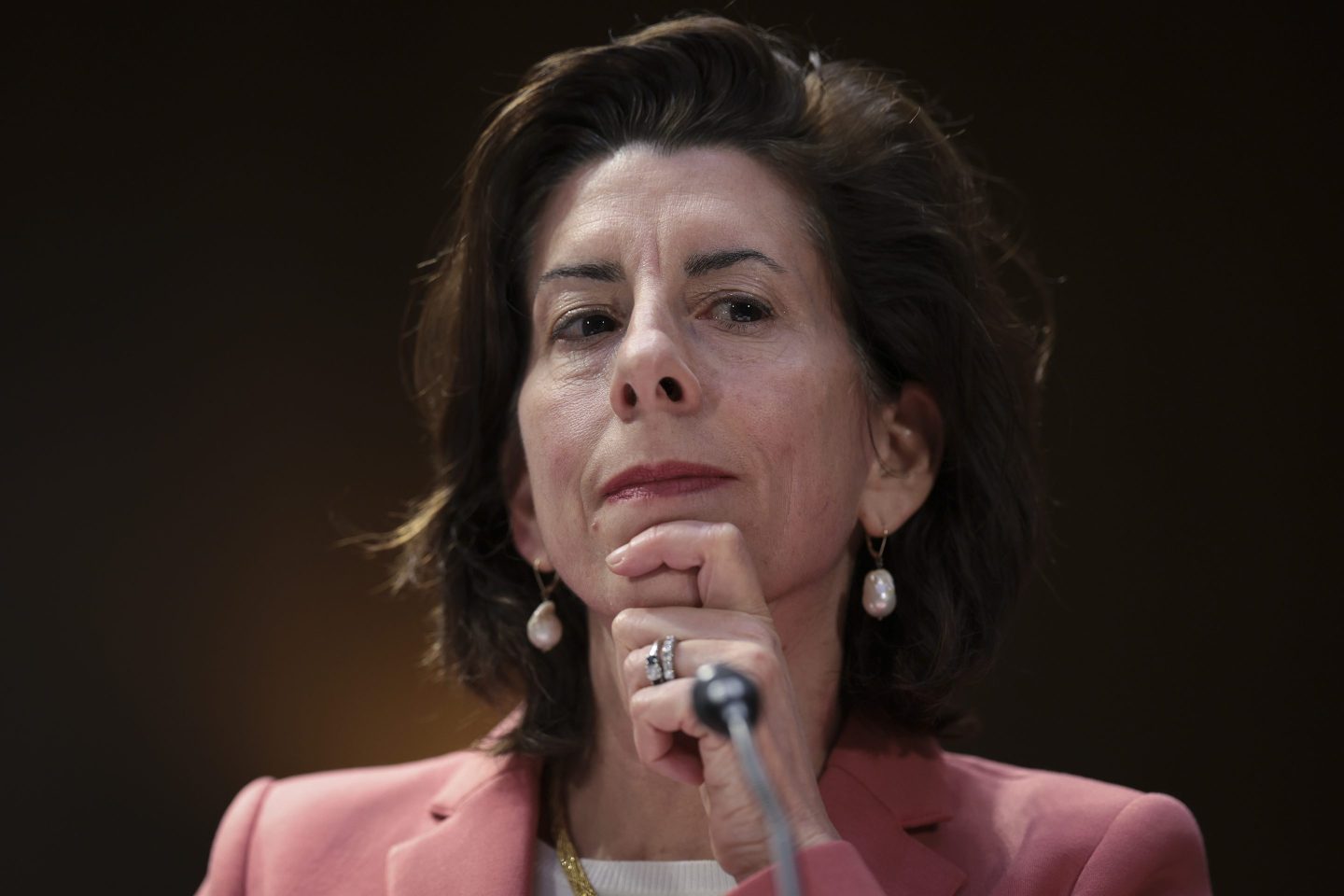 Gina Raimondo rubs chin