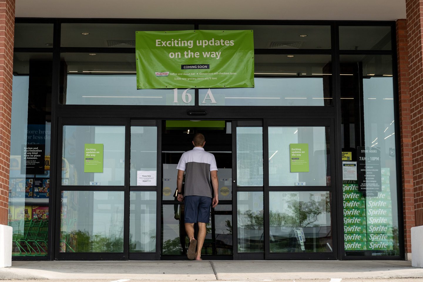 A customer enters an Amazon Fresh grocery store in Schaumburg, Ill., on July 24, 2023.