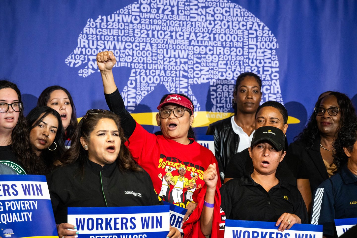 California workers celebrate the state’s passage of a $20 minimum wage for fast-food workers in September 2023.