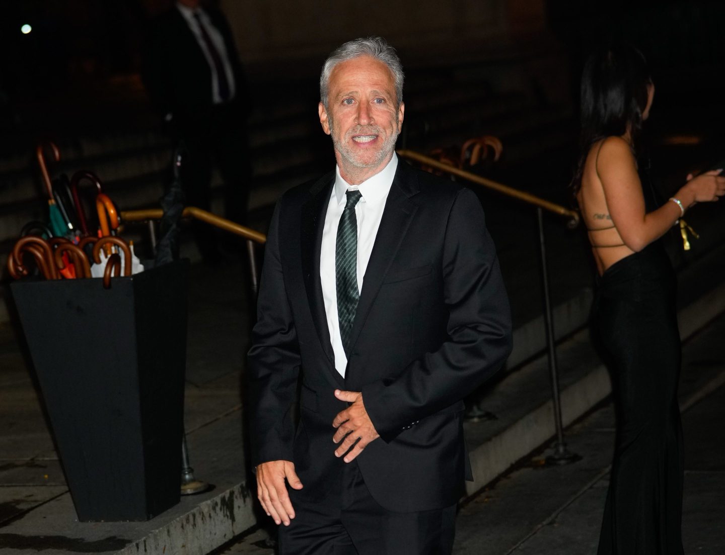 Jon Stewart is firing shots at Apple.