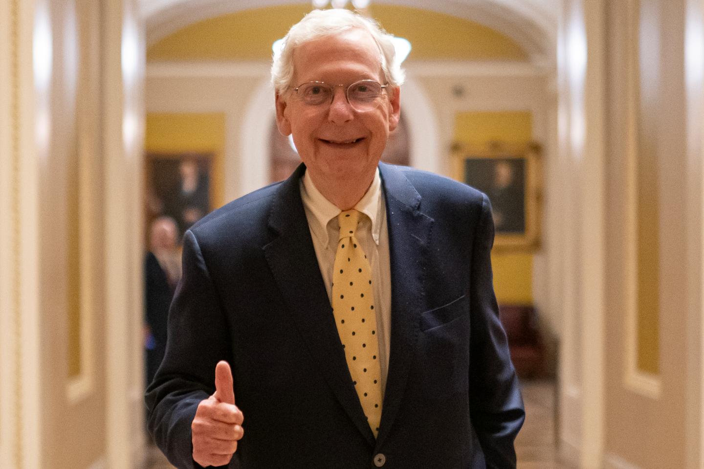 Senate Minority Leader Sen. Mitch McConnell (R-KY) departs the Senate Chambers on March 23, 2024 in Washington, DC.
