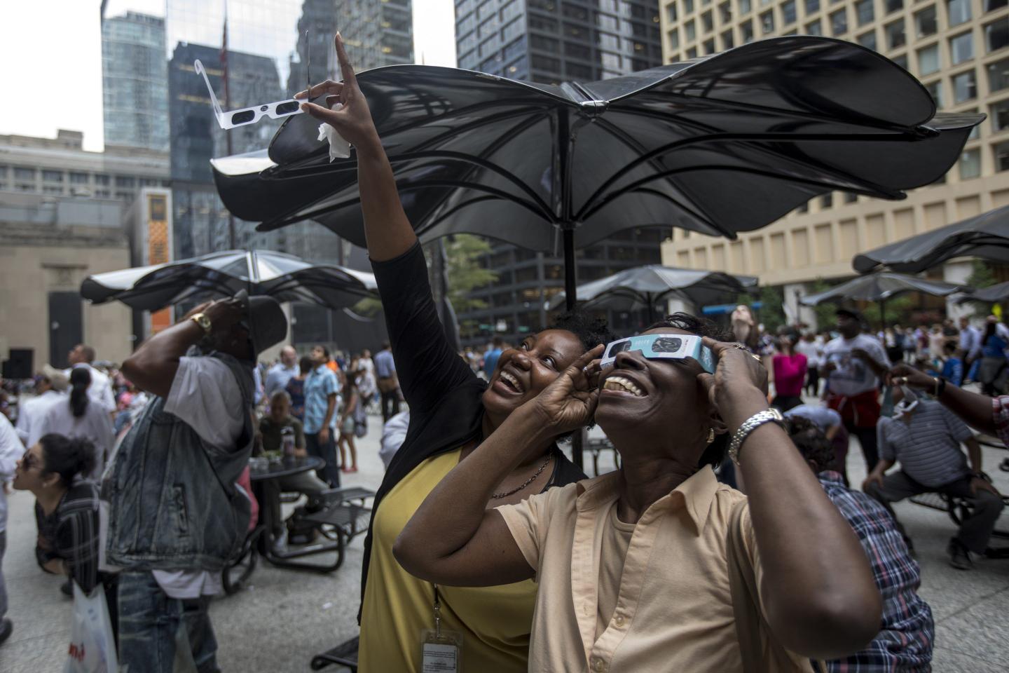 people watching solar eclipse
