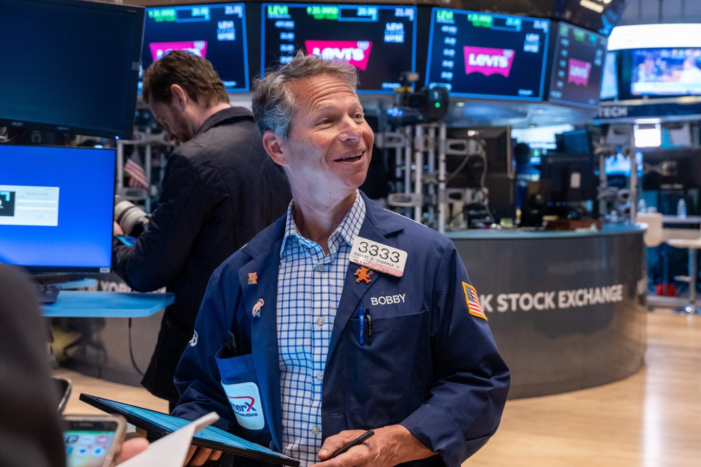 Traders work on the floor of the New York Stock Exchange