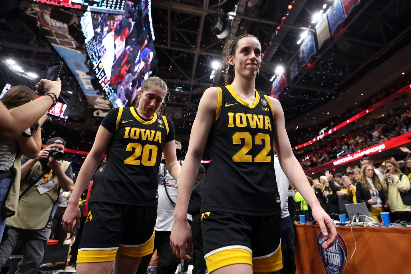 Caitlin Clark, No. 22 of the Iowa Hawkeyes, walks off the court after losing to the South Carolina Gamecocks in the 2024 NCAA Women's basketball championship on April 7, 2024 in Cleveland, Ohio.