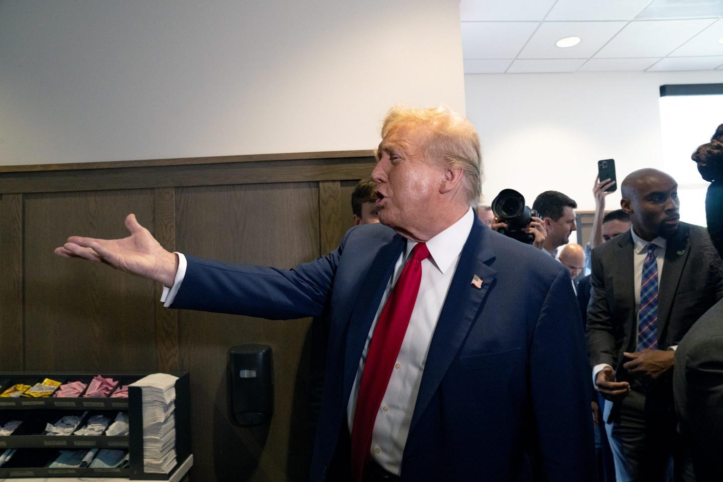 Donald Trump gesturing with hand