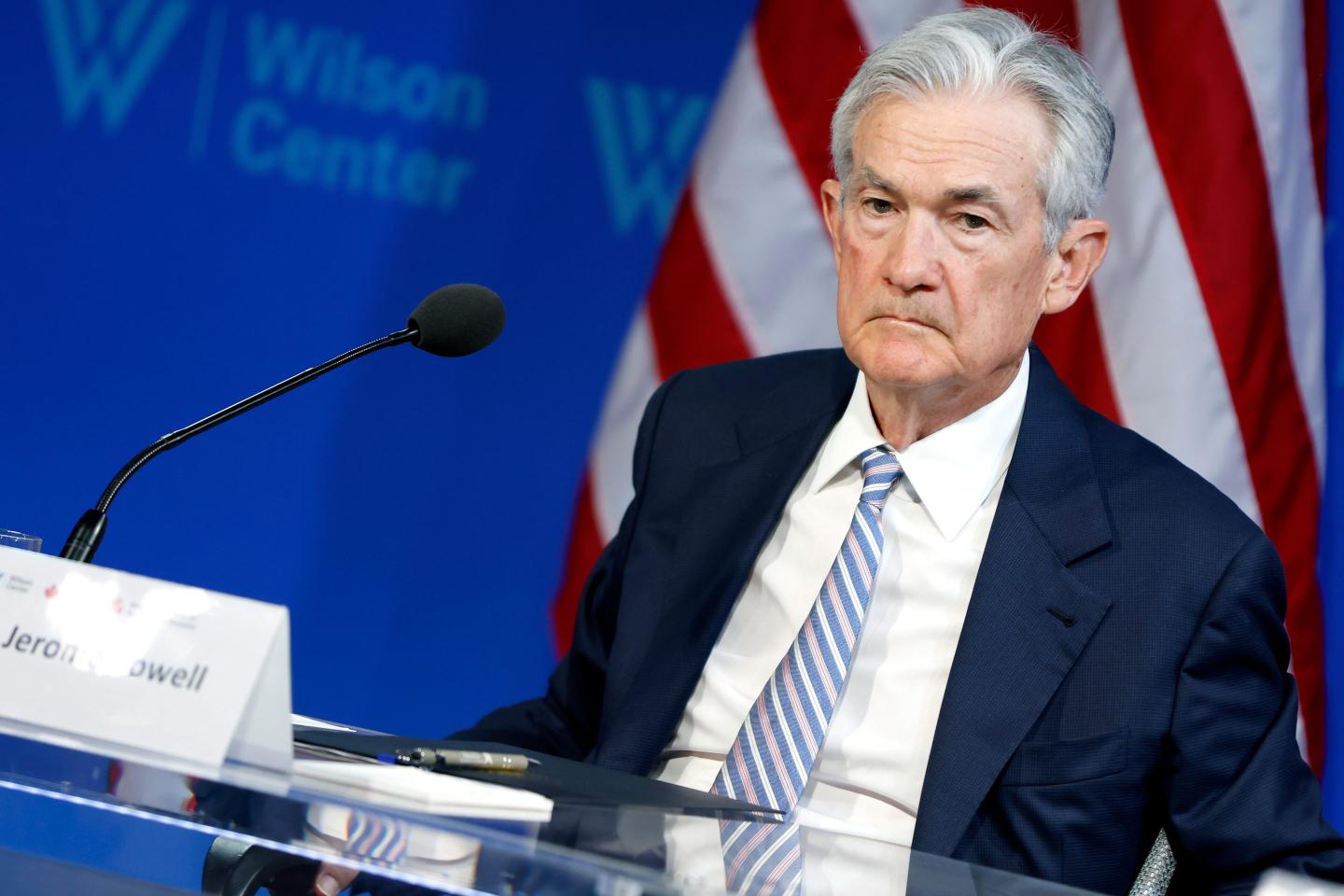 Jerome Powell sits during fireside chat