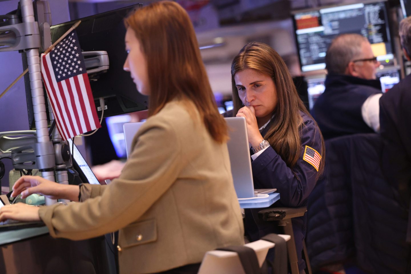 Traders work on the floor of the New York Stock Exchange during afternoon trading on April 9, 2024.