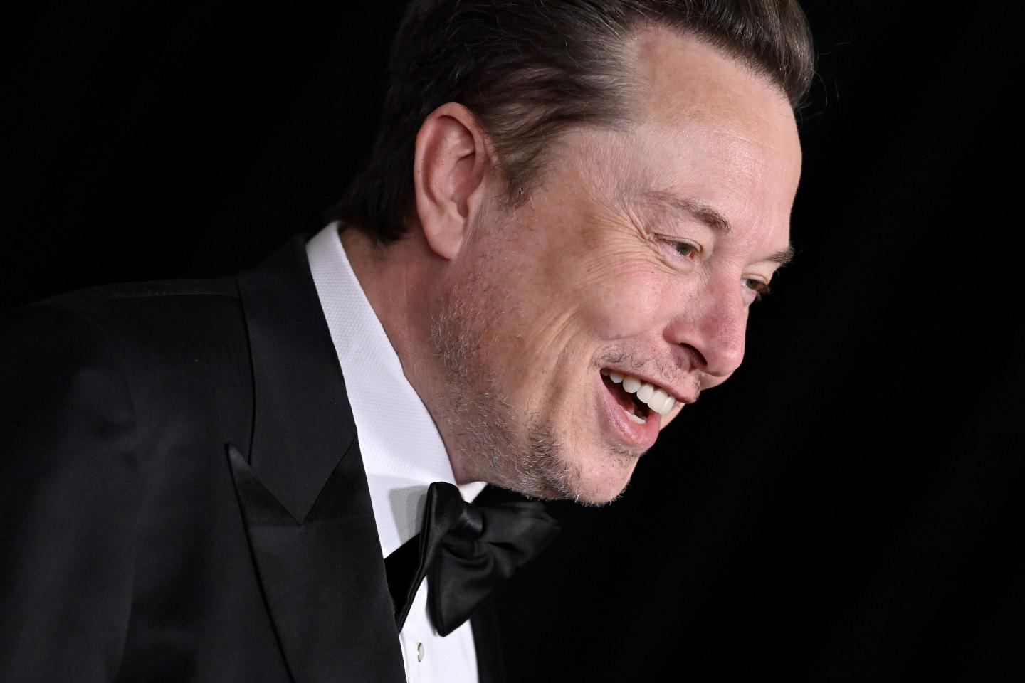 Elon Musk smiles