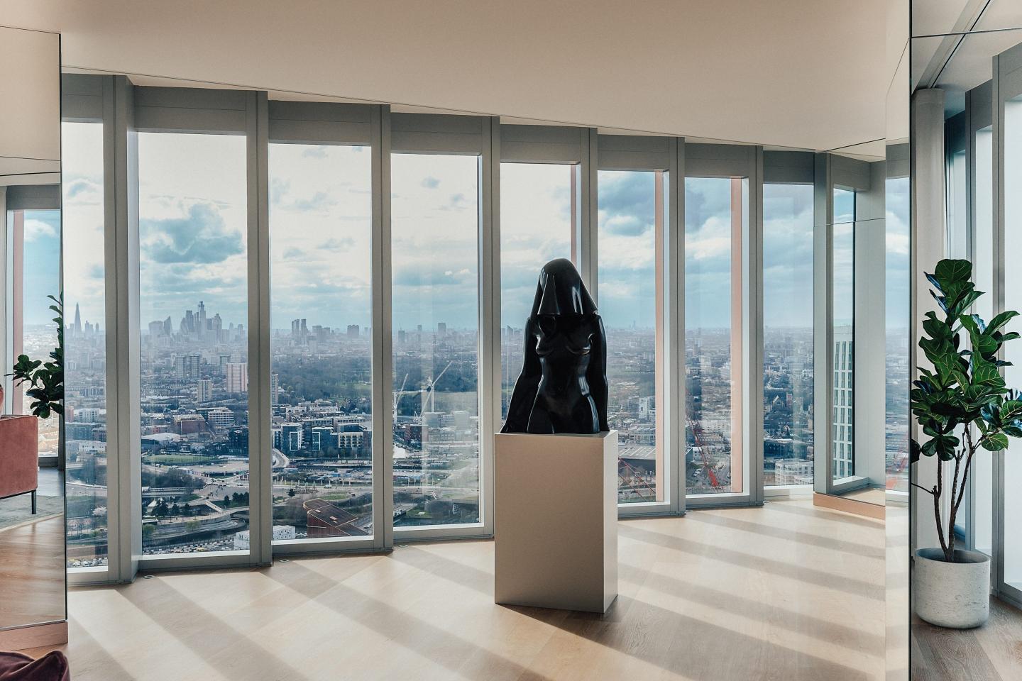 The flat has views of London landmarks such as St. Paul’s and the financial district skyscrapers of Canary Wharf and the City of London.