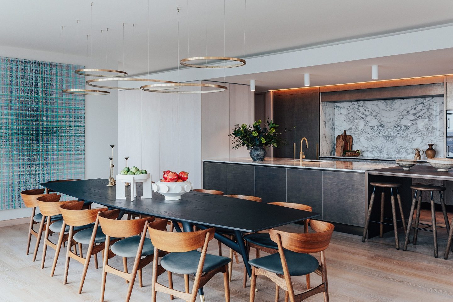 A discrete butler’s kitchen connected to the main kitchen holds additional ovens and sinks and has an entrance for household staff.