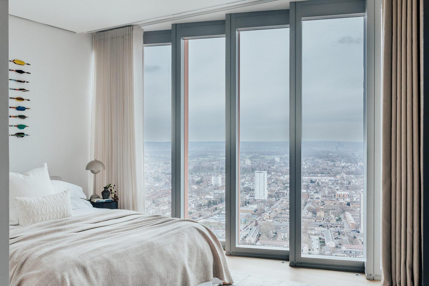 A pair of additional bedrooms, each with generous wardrobe space, fill out the top floor, along with three other bathrooms.