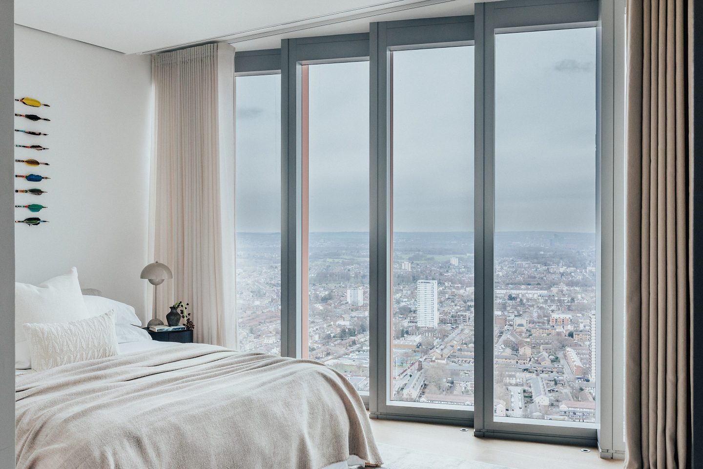 A pair of additional bedrooms, each with generous wardrobe space, fill out the top floor, along with three other bathrooms.