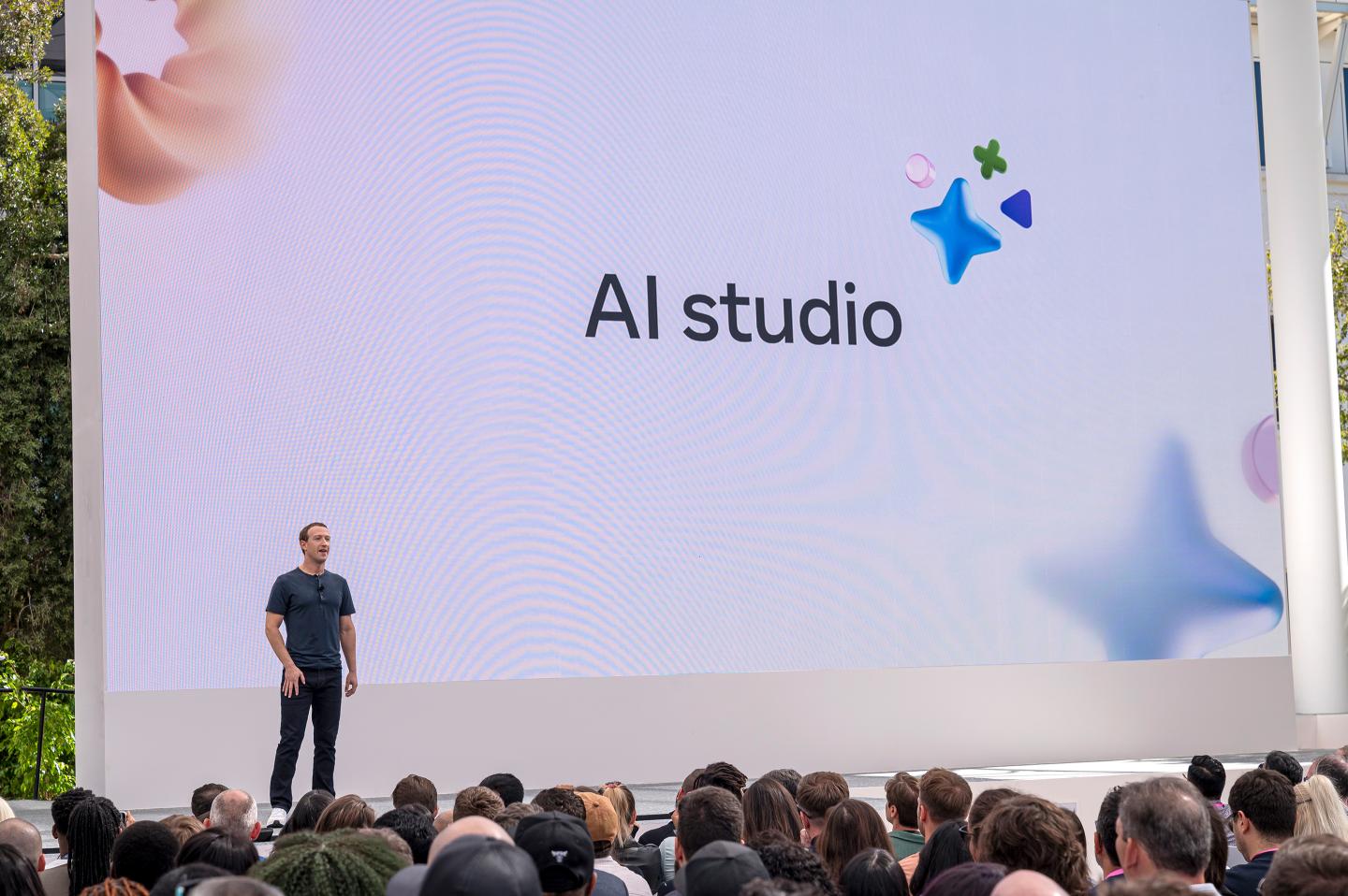 Meta CEO Mark Zuckerberg on stage in front of a screen that says AI Studio.