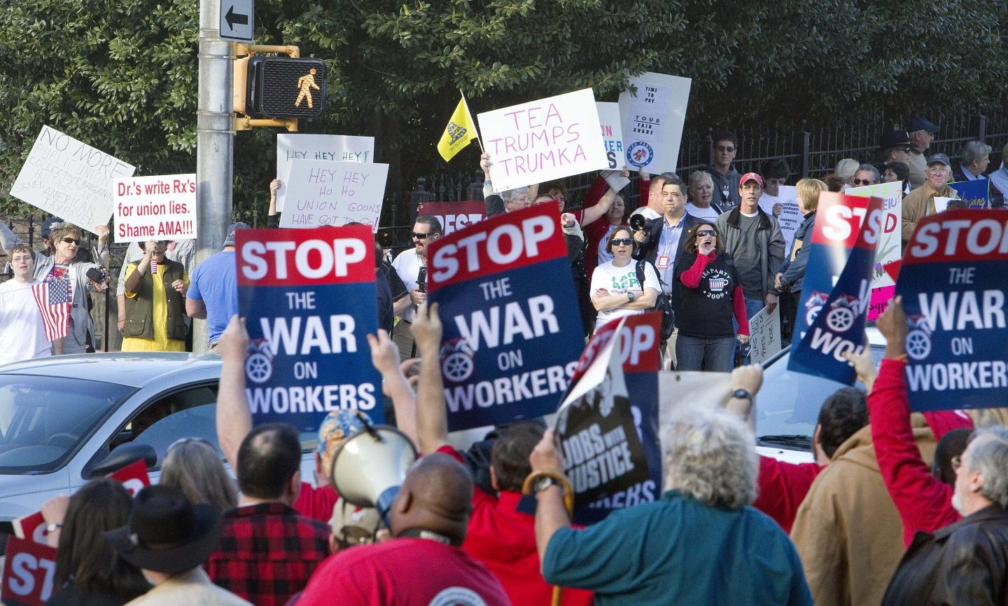 Wisconsin law that banned collective bargaining for most public employees back in court as unions sue to have it overturned