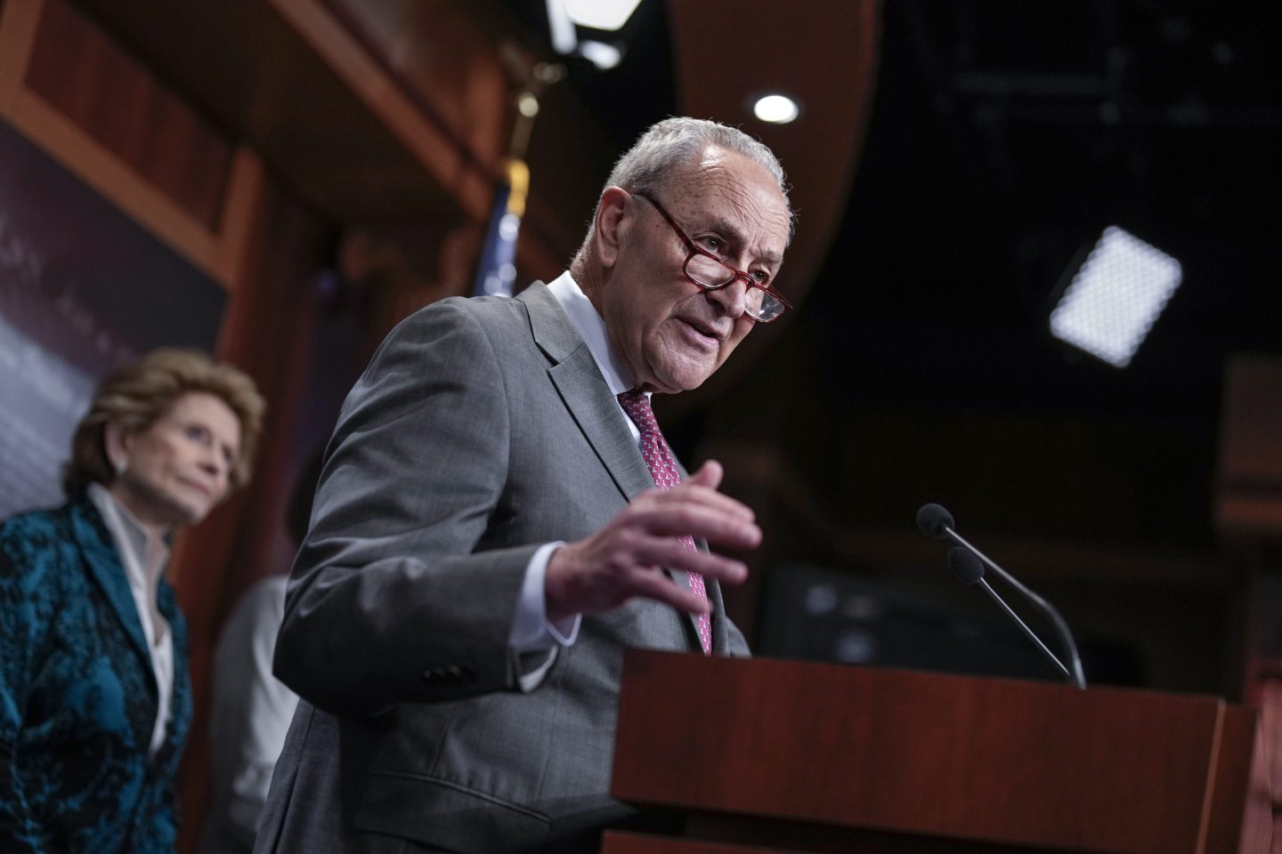 Senate Majority Leader Chuck Schumer, D-N.Y., joined at left by Sen. Debbie Stabenow, D-Mich., speaks to reporters after Senate Republicans blocked a bipartisan border security and immigration bill for a second time this year, at the Capitol in Washington, on May 23, 2024.