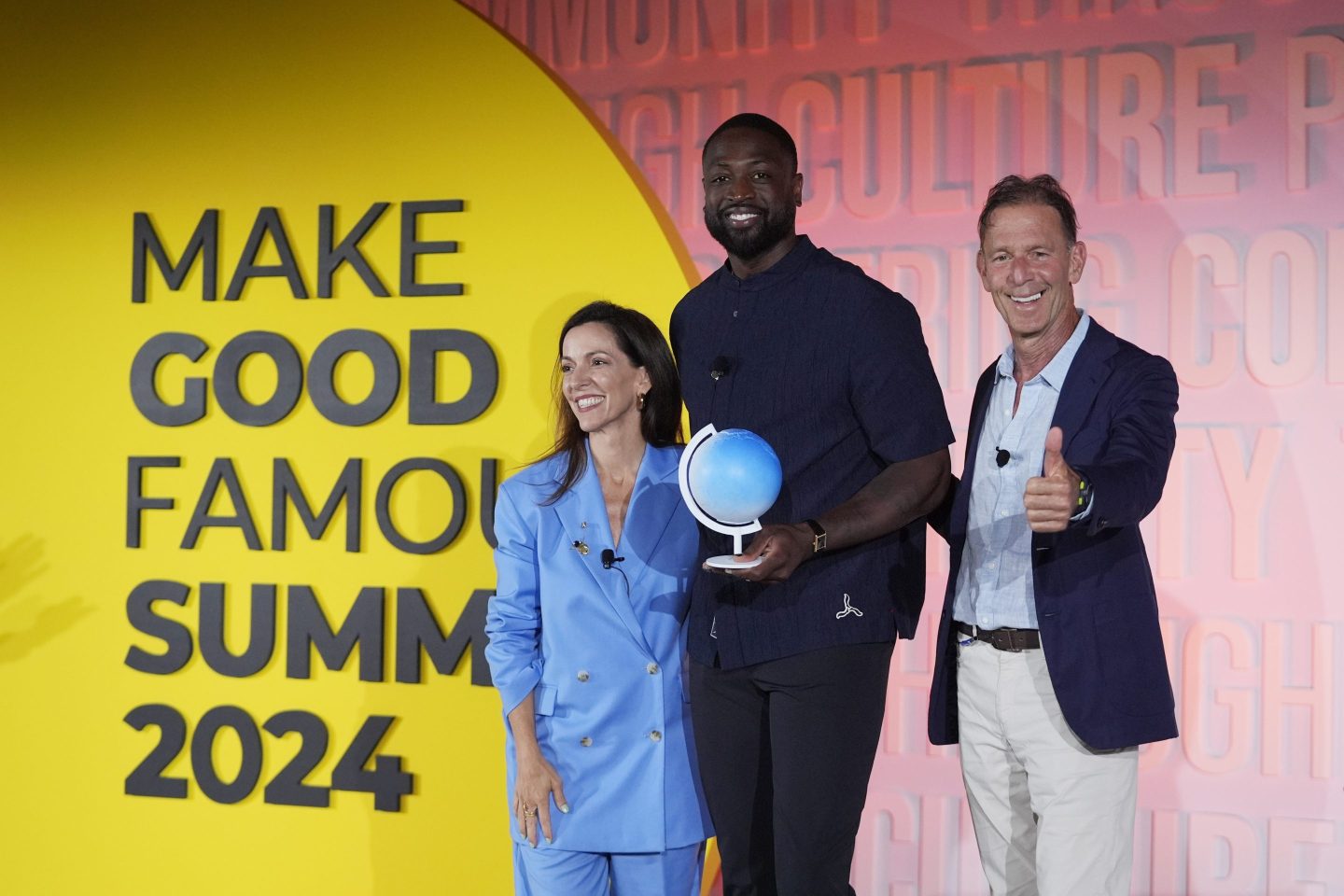 NBA Hall of Famer Dwyane Wade, center, poses with Carolina Garcia Jayaram, left, CEO of the Elevate Prize Foundation, and Joseph Deitch, right, founder of the foundation, after having received the Elevate Prize Catalyst Award, on May 23, 2024, at the Make Good Famous Summit in Miami Beach, Fla.
