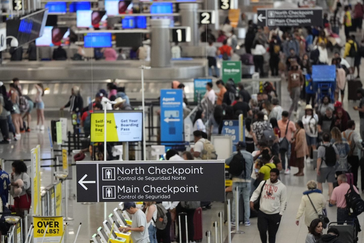 Travelers move through Hartsfield-Jackson Atlanta International Airport ahead of Memorial Day on May 24, 2024.