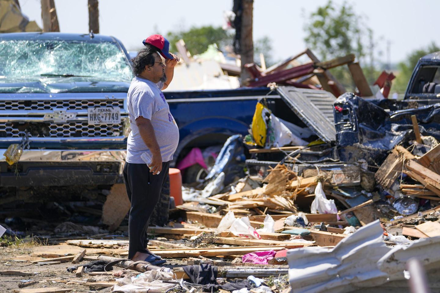 Dazed Texas county sifts through homes mangled by tornado in powerful storms that killed over 15 across the South: ‘It was horrific. Hellish’