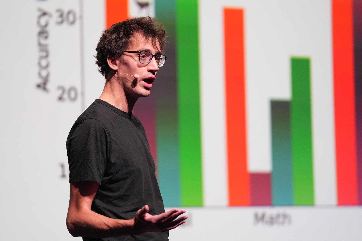 Mistral AI cofounder Arthur Mensch giving a presentation