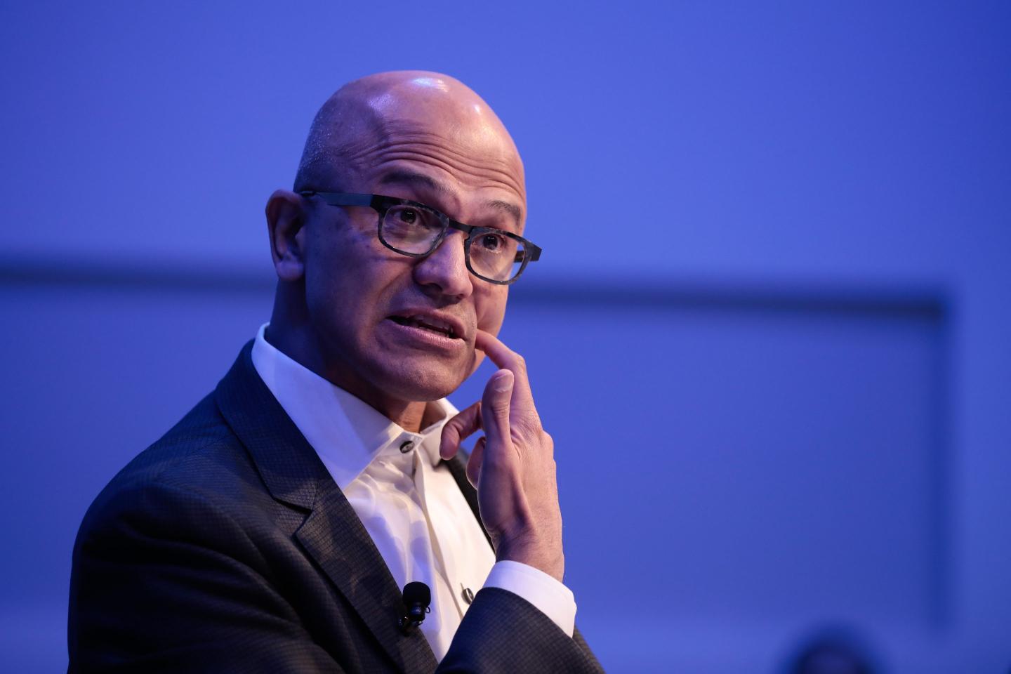 Microsoft CEO Satya Nadella speaking at a panel.