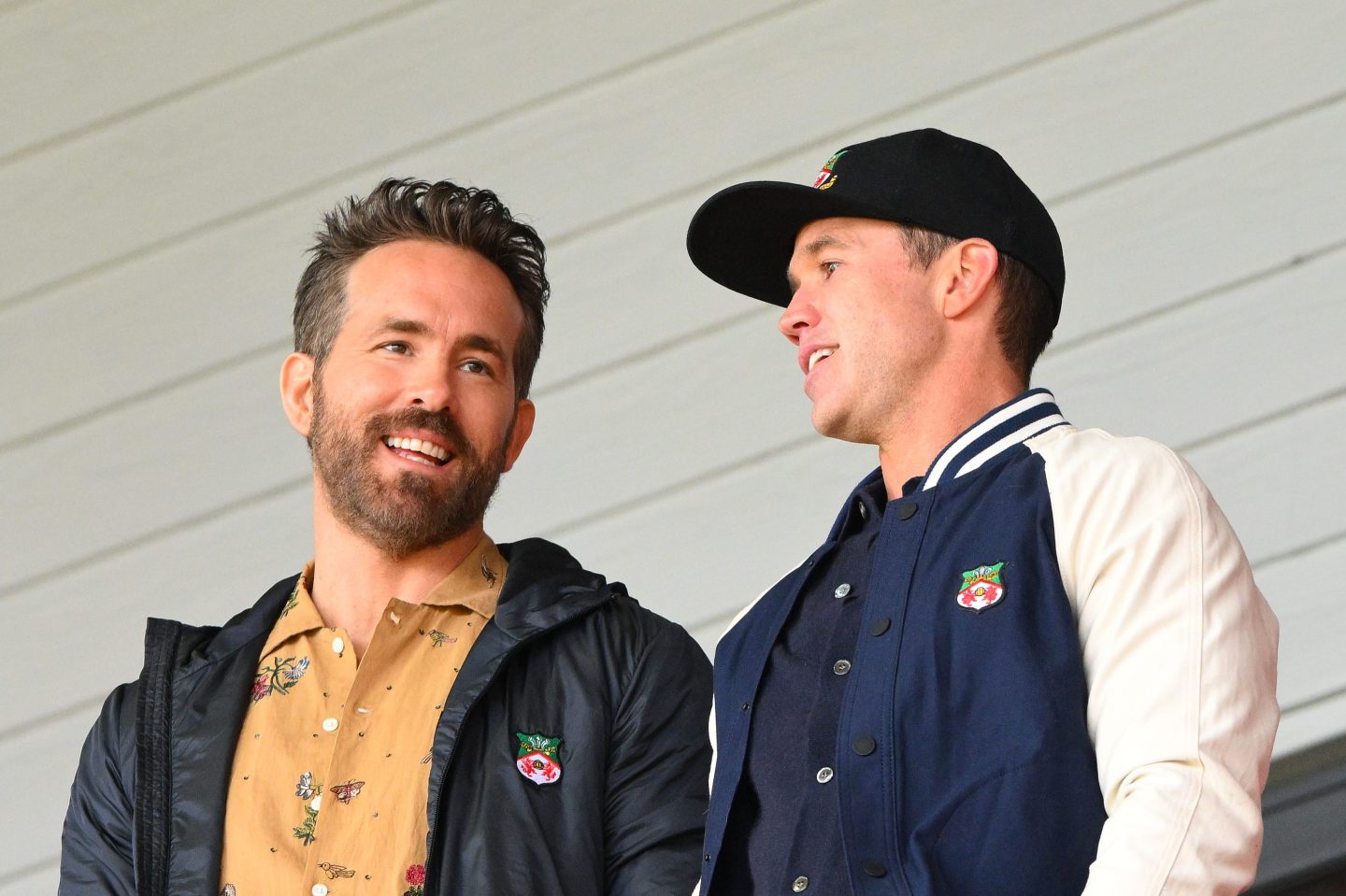 Wrexham owners, Ryan Reynolds (L) and Rob McElhenney (R) during the Vanarama National League match between Wrexham and Notts County at the Glyndr University Racecourse Stadium, Wrexham.