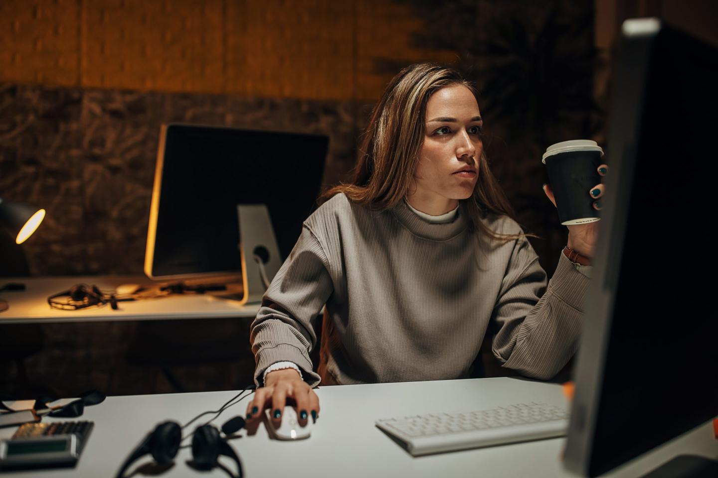 Woman working late