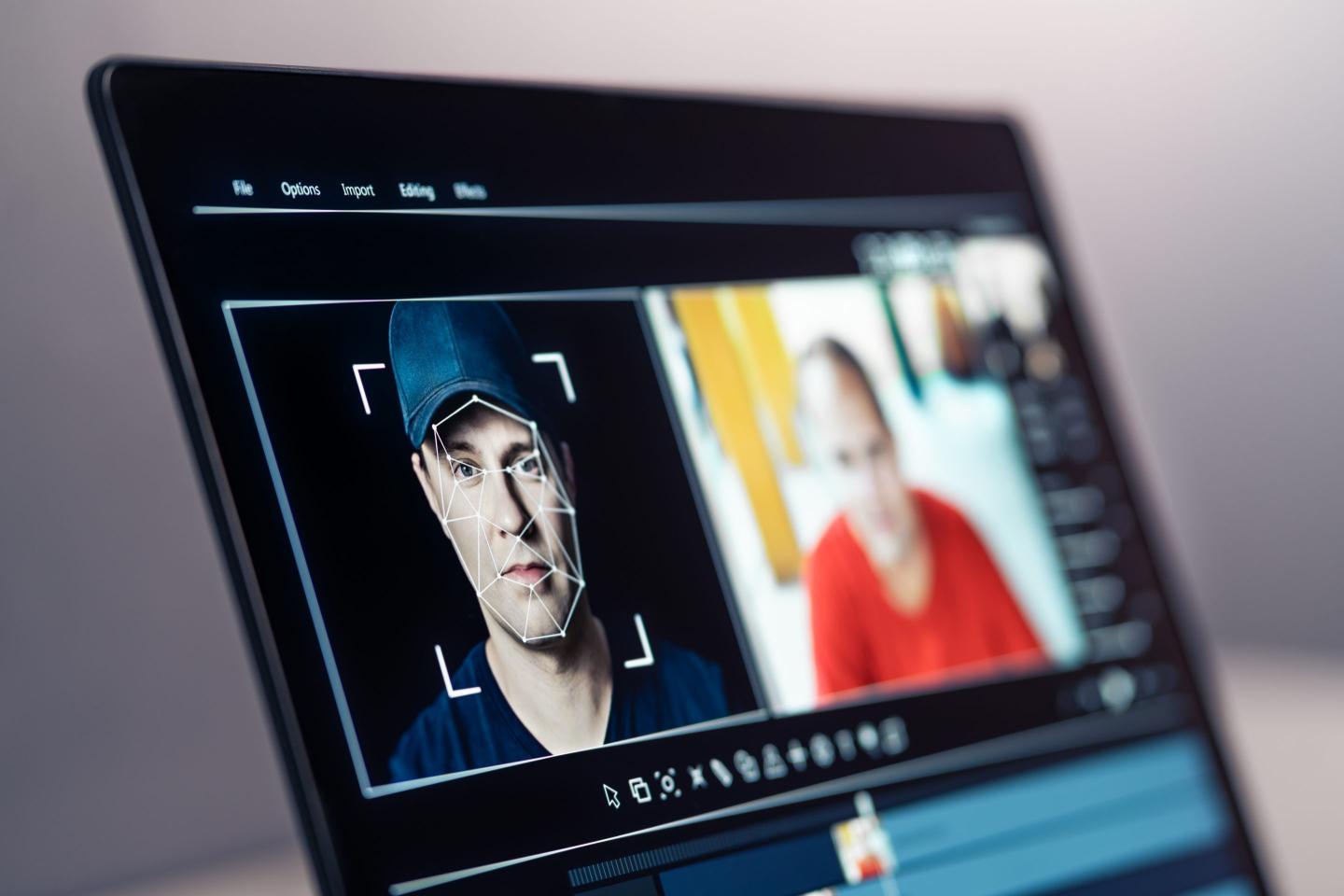a deepfake image seen on a laptop screen