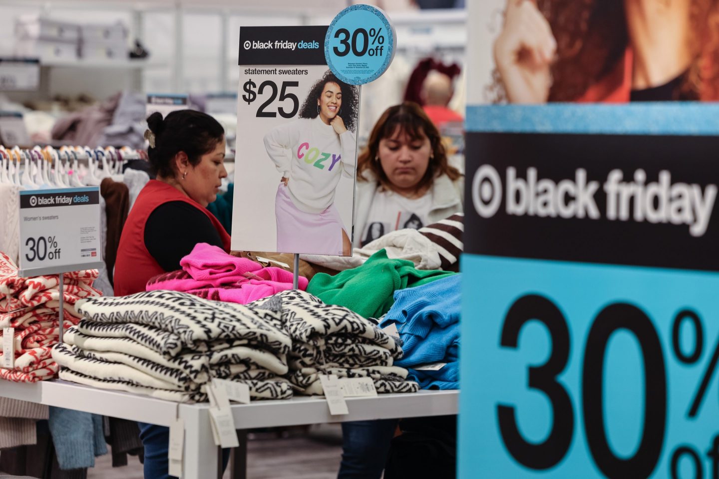Shoppers look at clothing on display at Target.