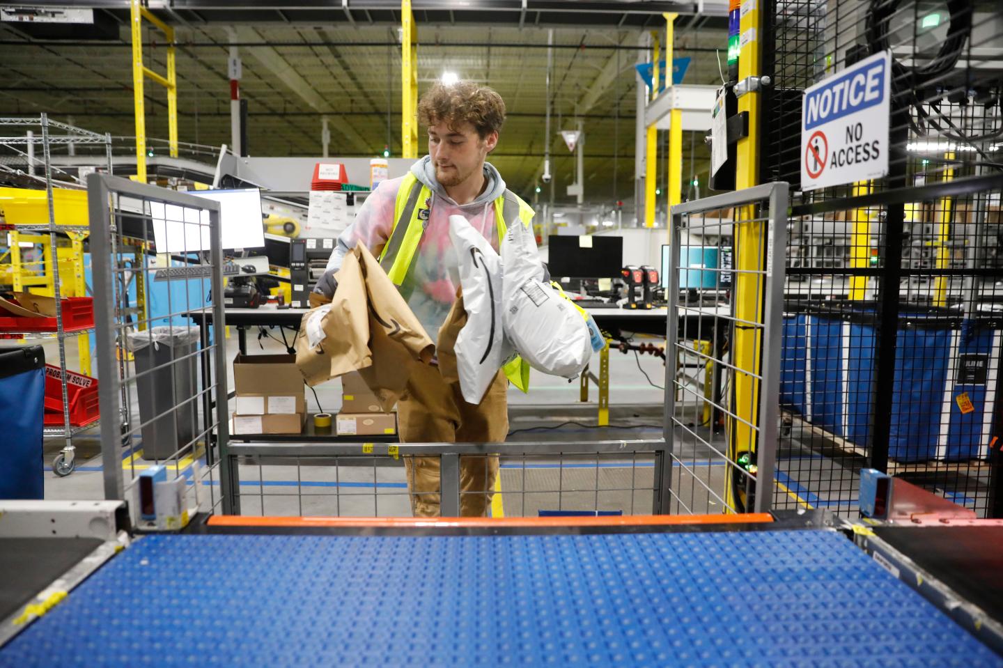 Amazon raised warehouse wages to $15 an hour 5 years ago. Today, half of workers surveyed told researchers they struggle to afford food or rent
