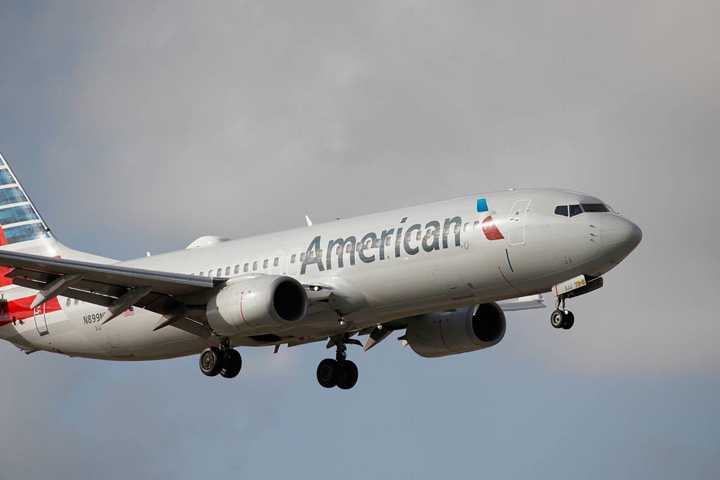 An American Airlines flight attendant has been arrested for allegedly trying to secretly record a 9-year-old girl using the aircraft's bathroom.