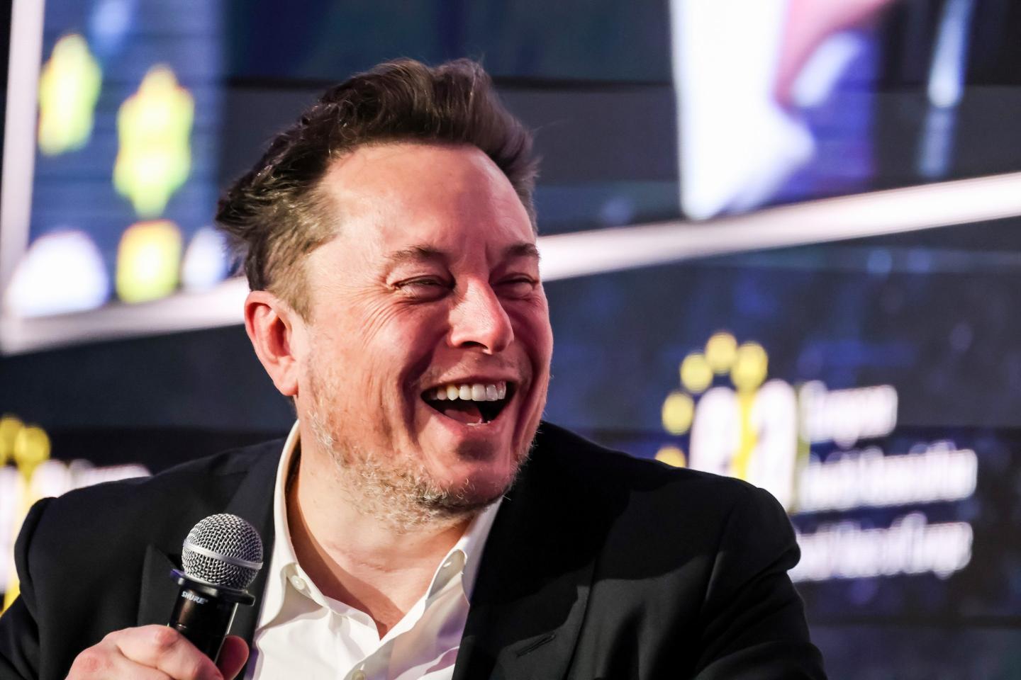 Elon Musk laughing