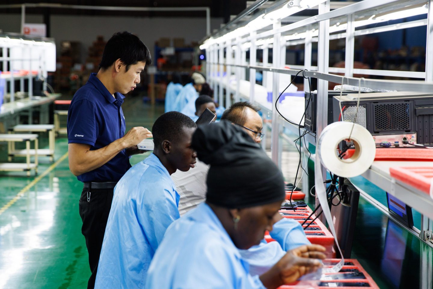 A Chinese worker at the MiOne mobile phone factory in the Sino-Uganda Mbale Industrial Park in Mbale, Uganda on Jan. 24, 2024.