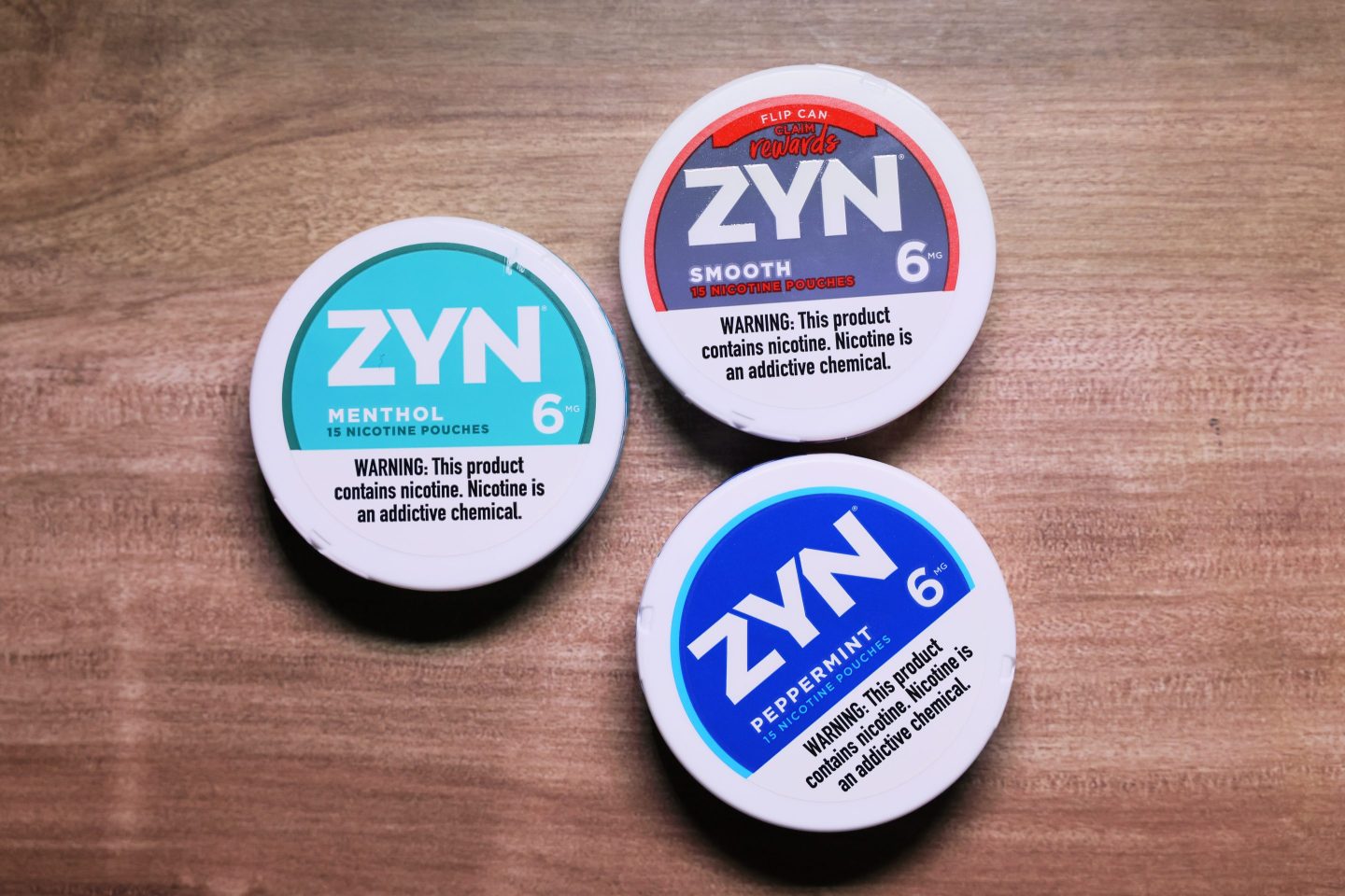 cans of Zen tobacco products