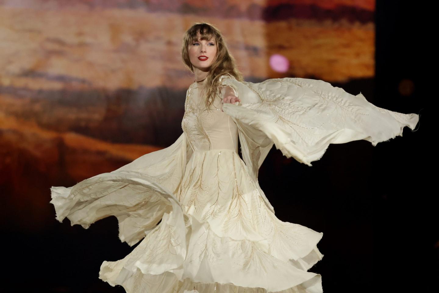Taylor Swift performing on stage in Singapore.
