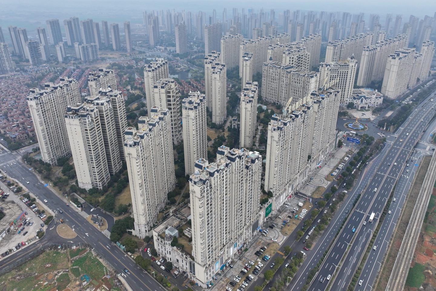 Beijing narrowly escapes having to cover the debts of developer Country Garden as it scrounges up a $9 million interest payment