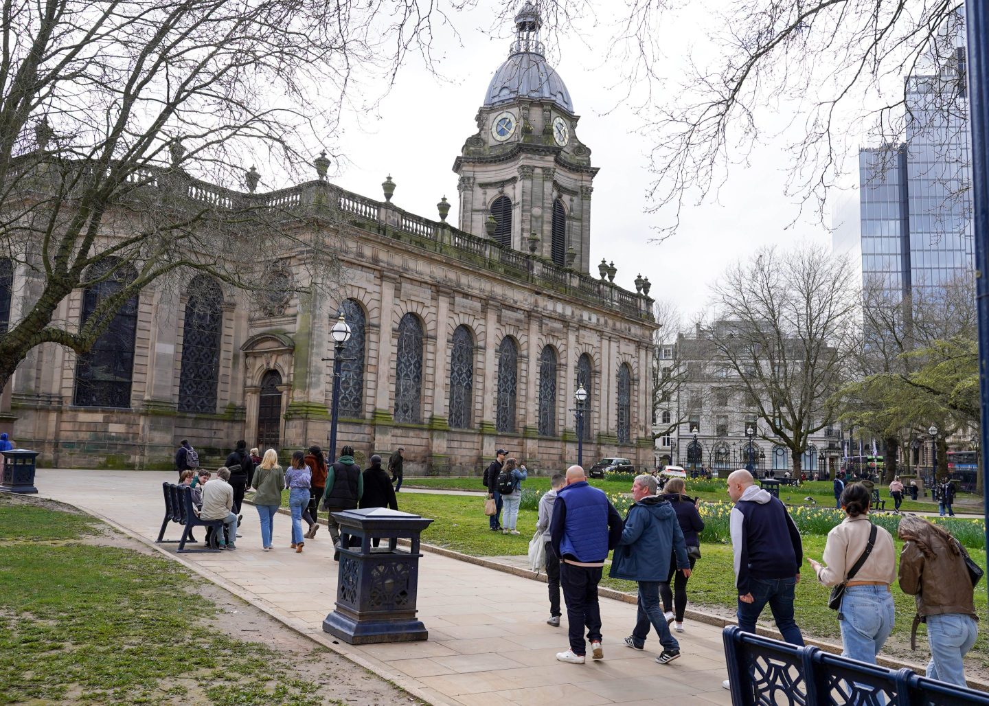 people walking down a street in Birmingham