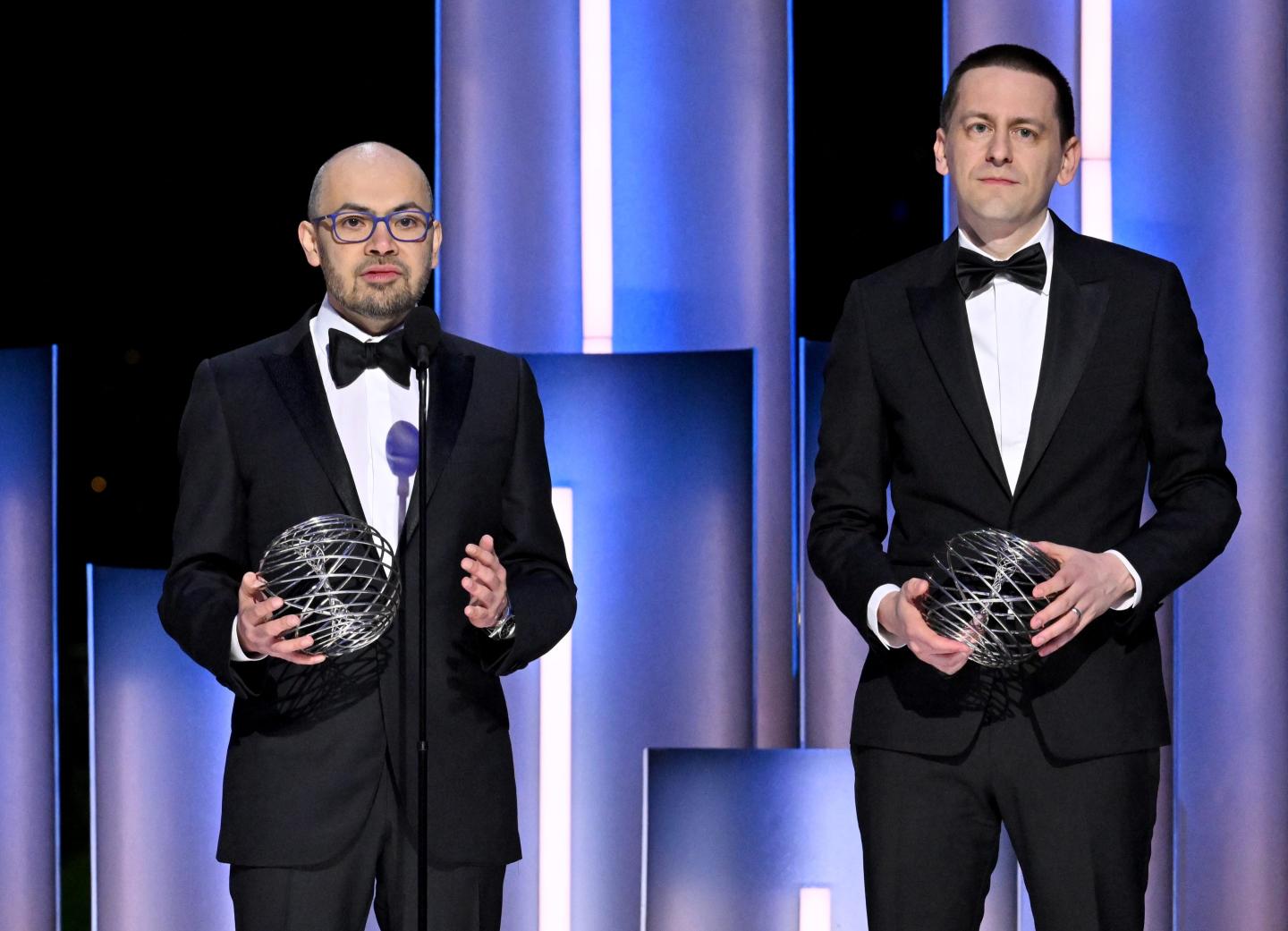 Good DeepMind CEO Demis Hassabis and John Jumper, the scientist who heads the company's protein structure team, accepting a Breakthrough Pirze for their work on AlphaFold 2.