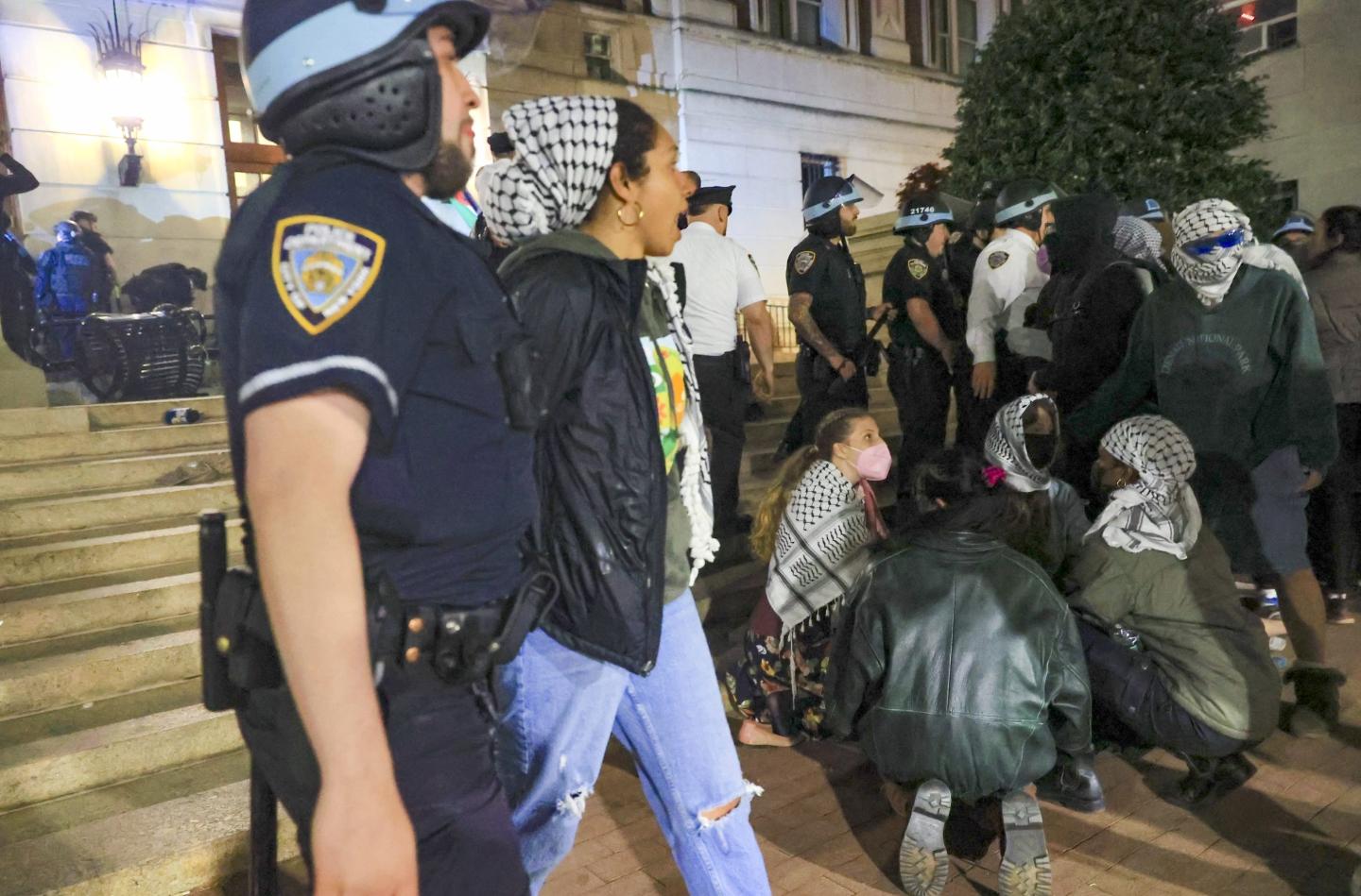 NYPD officers detain dozens of pro-Palestinian students at Columbia University near the Gaza Solidarity Encampment on April 30, 2024.