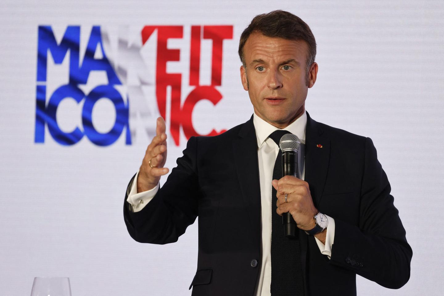 France's President Emmanuel Macron delivers a speech during the seventh "Choose France Summit."