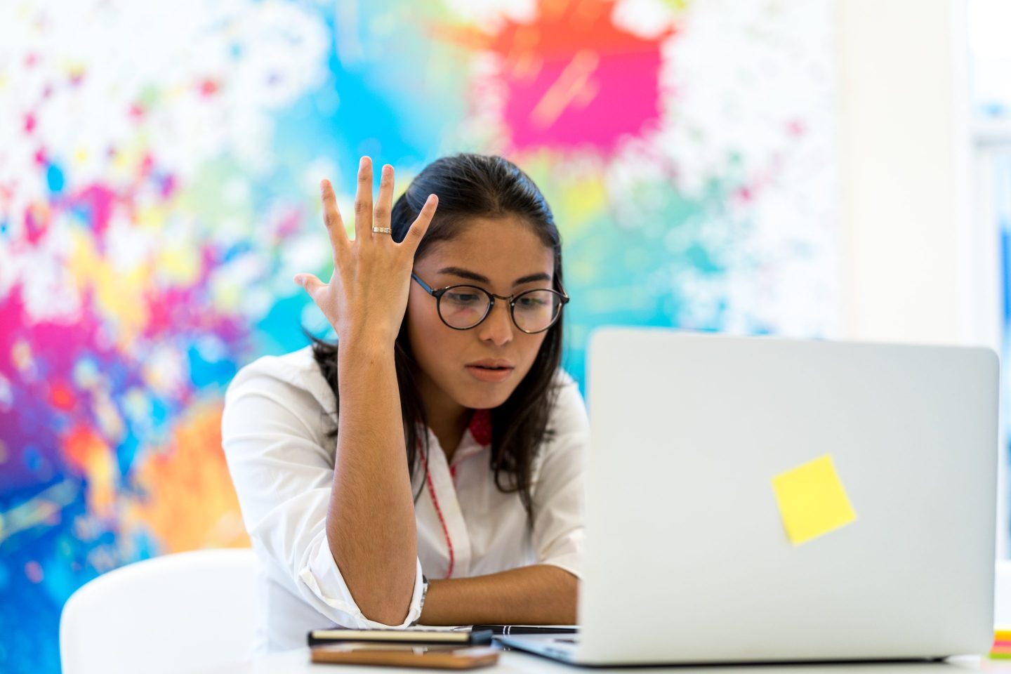 Woman working on computer.