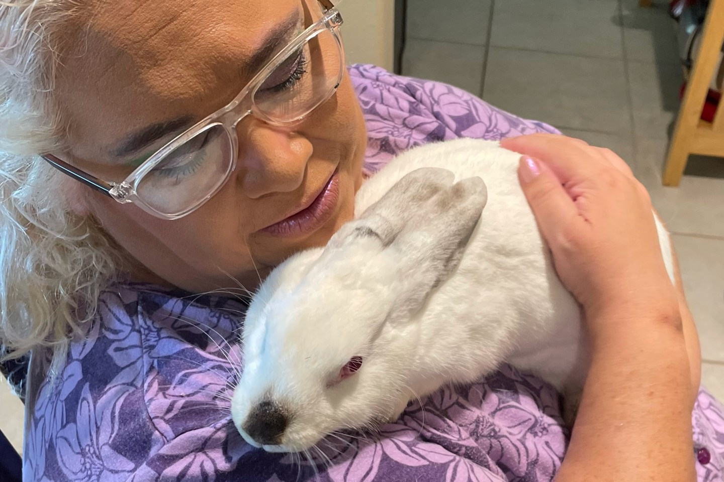 Charlene with her daughter's rabbit, Boo.